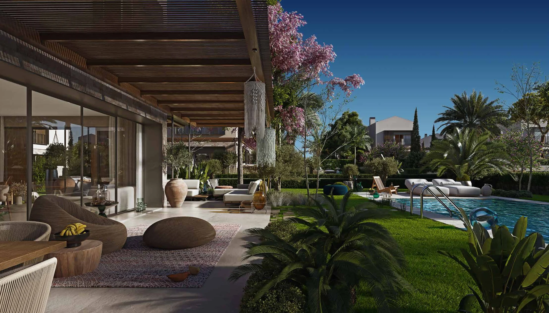 Überdachte Villa-Terrasse mit Gartenblick
